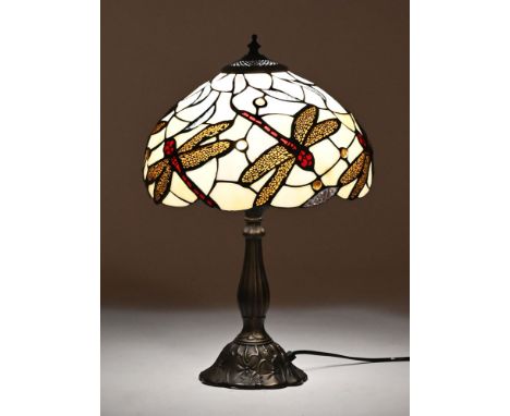 A 20th century Tiffany style lamp, the glazed shade decorated with dragonflies.  Height +/- 46 cm.   CONDITION REPORT:  The l