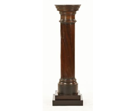 A late 19th/early 20th century mahogany pillar, of cylindrical form with square stepped base.  Height 110 cm, top diameter 29