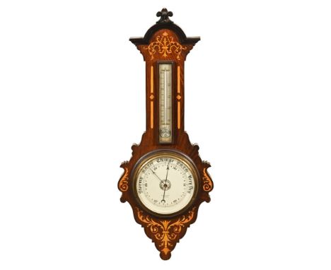 An Edwardian inlaid rosewood aneroid barometer, the dial marked W Wainewright Southsea, with mercury thermometer.  Height 86 