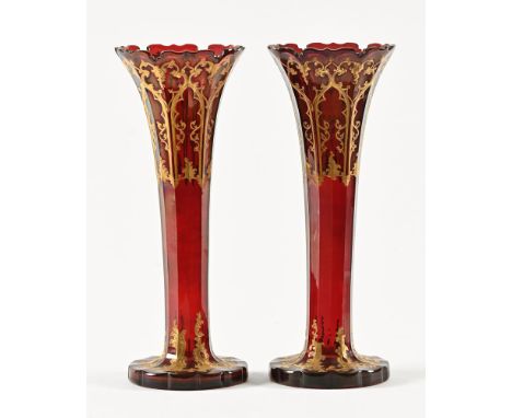 A pair of Victorian circa 1880 red glass vases with gilded overlay, Gothic arch design.  Height 37.5 cm.   CONDITION REPORT: 