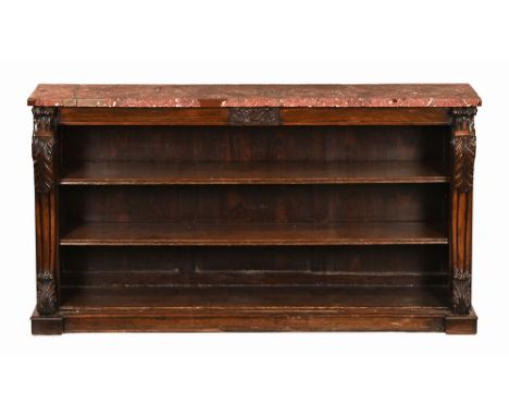 A Regency rosewood marble topped open bookcase, with adjustable shelves with scroll and carved supports and with plinth base.