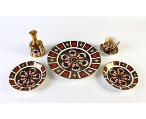 Six pieces of Royal Crown Derby, dinner plate 10 1/2" diameter, two saucers 6 1/2" diameter, pin dish 4 1/4" diameter, cup an