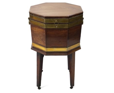 A George III mahogany triple brass banded octagonal cellarette with partially fitted interior, on stand with squared tapered 