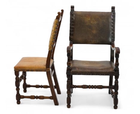 A set of fourteen 17th century style oak dining chairs including a pair of carvers, with brass studded leather backs and seat