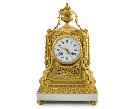 Roblin &amp; Fils à Paris. A 19th century French Louis XV style ormolu and white marble mantel clock with ornate foliate moti