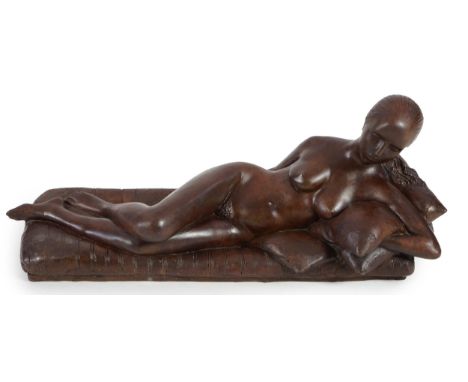 § § James Butler (1931-2022). A bronze figure of a female nude reclining upon cushions, signed in the bronze and numbered V/V