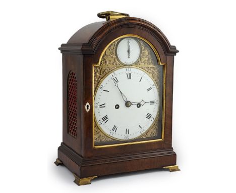 Charles Scholfield of Barnsley. A George III arched pearwood cased bracket clock with enamelled Roman dial and enamelled stri