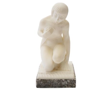 Manner of Gugliemo Pugi (1850-1915). An Italian Art Deco carved marble figure of a crouching bather kneeling and semi-draped,