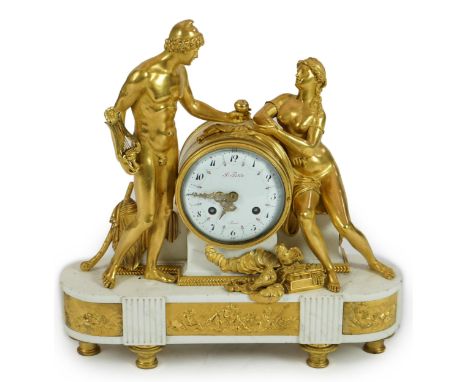 J. Petite of Paris. A 19th century French ormolu and white marble eight day mantel clock surmounted with figures of the golde