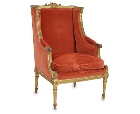 A Louis XVI style carved giltwood fauteuil, circa 1900, with ribbon crest and guilloche carved frame, upholstered back, arms 