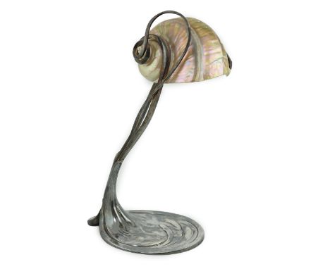 An Art Nouveau electroplate shell mounted table lamp, by Moritz Hacker, c.1900, the turbo shell shade with sinuous scrolled t