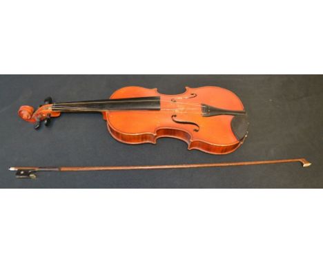 A violin, the two-piece back 36cm long excluding button, paper label inscribed Supplied by Boosey & Hawkes, 295 Regent Street