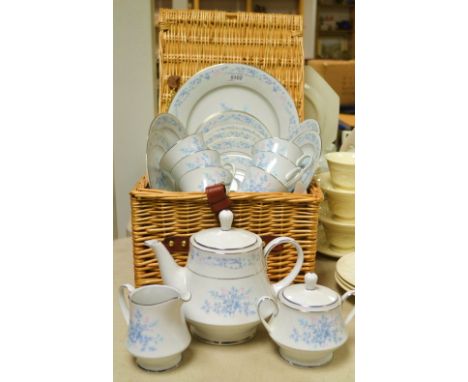 A Noritake Carolyn tea service for six, comprising teapot, sucrier, creamer, cups and saucers, side plates, cake plate in a w