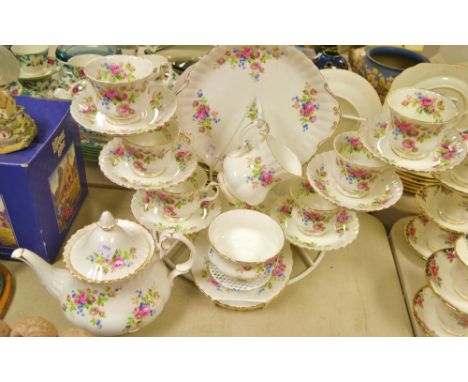 A Royal Albert Moss Rose pattern six setting tea service including, teapot milk jug, sugar bowl etc. 