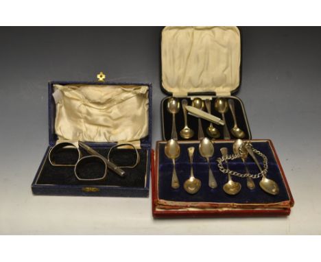 Silver- a cased set of six Edwardian teaspoons, Birmingham 1903; others 1930; a trio of napkin rings, Birmingham 1939; an Alb
