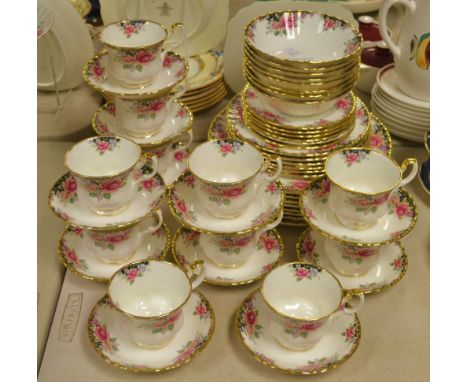 A Royal Albert Concerto tea and dinner serve, 11 cups and saucers, 8 dinner plates, dessert plates, bowls, side plates, etc. 