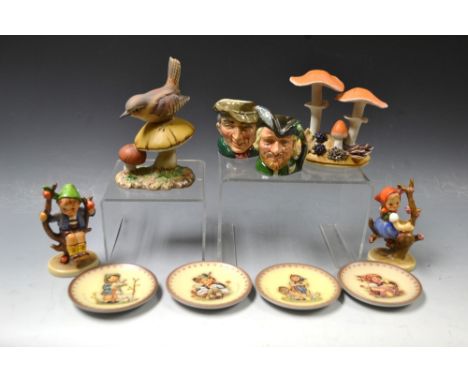 Ceramics- a pair of Goebel figures, apple tree boy & girl; four motif plates; a Royal Doulton small character jug, The Poache