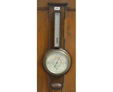 An early 20th century short and mason stormo guide barometer thermometer, beaded oak case, c. 1930