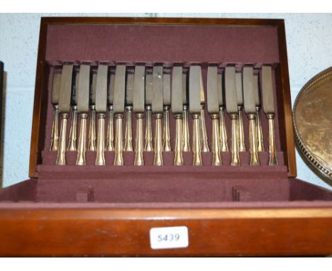 A part canteen of flatware, comprising twelve white metal hafted table knives, possibly silver, with steel blades; a conformi