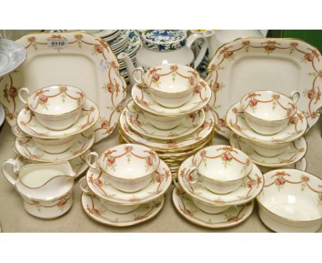 An Aynsley twelve setting tea service, decorated with pink roses and brown ribbon swags, printed marks, pattern No. A1920 