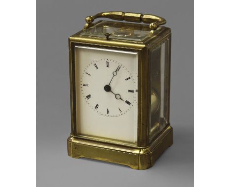 A FRENCH BRASS CARRIAGE CLOCK, with white enamelled dial and two train push-button repeating mechanism signed 'James Et Walte