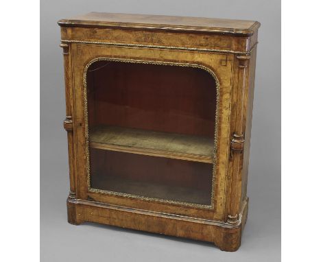 A VICTORIAN BURR WALNUT PIER CABINET,  the rectangular top with a moulded border above a decorative frieze and gilt metal mou
