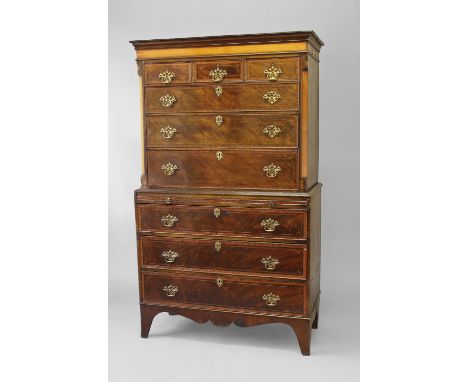 A GEORGE III MAHOGANY CHEST ON CHEST, the upper section with a moulded cornice above a satinwood frieze with chequered string