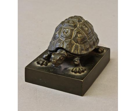 AN EARLY VICTORIAN BRONZE INK WELL IN THE FORM OF A TORTOISE, the naturalistic shell sprung to reveal an inkwell, the mechani