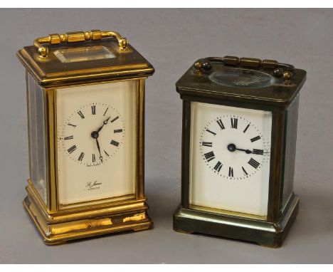 AN ENGLISH  CARRIAGE CLOCK AND ANOTHER, the English clock with white enamel dial marked 'St James, London' with an 11 jewel s