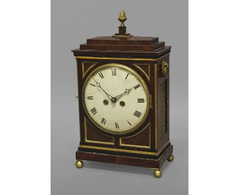 A REGENCY MAHOGANY AND BRASS CASED BRACKET CLOCK, with a 20cm convex white enamelled dial with Roman numerals, with twin wind