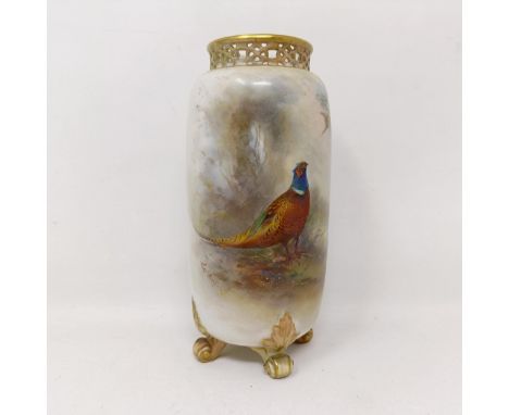 A Royal Worcester vase, with a pierced rim, decorated a pheasant, 15 cm highNo chips or cracks or restoration, some surface s