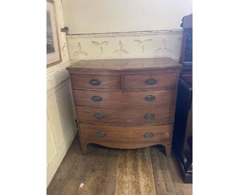 A mahogany bow front chest, 104 cm wide, a stool, a wine table, a folding table, a writing box, four chairs and a clock (10) 