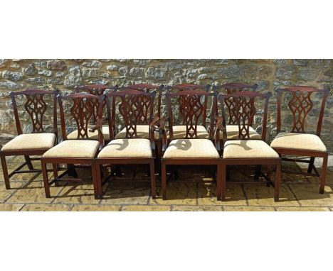 A set of ten mahogany Chippendale style dining chairs, with pierced splat backs and drop in seats (8+2)Retailed in Dodge's of