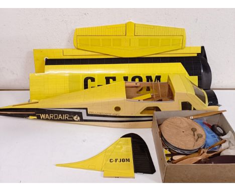 A remote control model aeroplane and assorted parts, partially constructed (qty) 