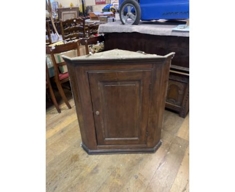 An oak drop leaf table, 103 cm wide, a commode, two corner cabinets, a sewing box, a cake stand, and a Sutherland table (7) 