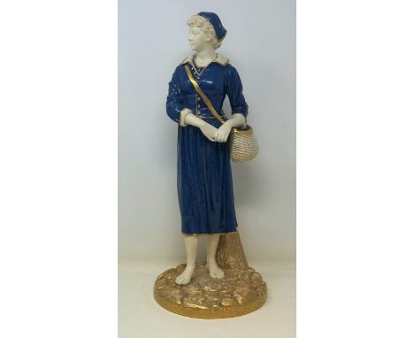 A Royal Worcester figure of a lady holding a basket, 44 cm high 