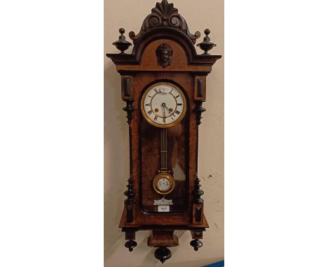 A Vienna regulator type clock, in a walnut case, 90 cm high 