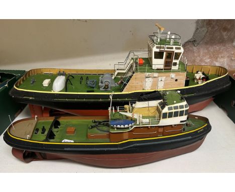 A model of a tug boat, 80 cm wide, and another, 60 cm wide (2) 