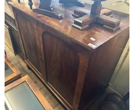 A mahogany cupboard, 120 cm wide, a mahogany commode, two tables, a mirror, a foot stool, and a lamp (7) 