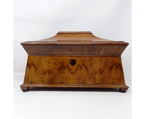 A 19th century walnut tea caddy, the hinge top to reveal marquetry inlaid caddies, and a later cut glass mixing bowl, 38 cm w