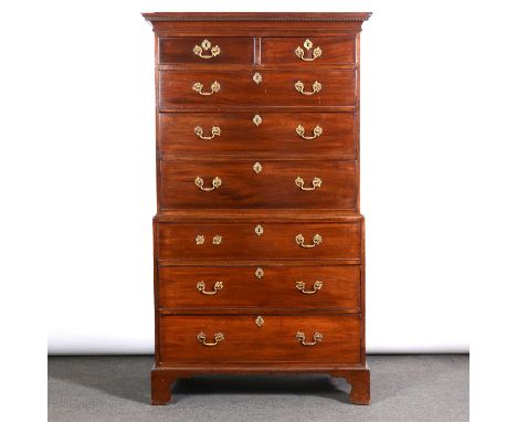 George III mahogany chest on chest, dentil and cavetto cornice, two short drawers above six long graduating drawers, cast dro