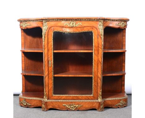 Victorian figured walnut credenza, serpentine top with moulded edge, central glazed door enclosing two shelves flanked by ope