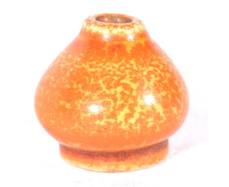 Pilkington's Royal Lancastrian, a rare miniature 'Twiffler' vase, thrown by Edward T Radford, in orange vermillion glaze, 1cm