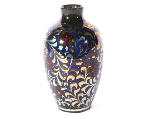 William S Mycock for Pilkington's Royal Lancastrian, a lustre vase, 1915, ovoid body (shape 2619), painted with scrolling fol