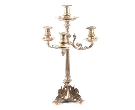 A composite Victorian silver four-light silver candelabra, Henry Wilkinson &amp; Co, London 1871, the drip pan and nozzles Ho