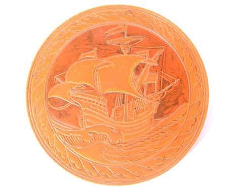 Pilkington's Royal Lancastrian, a Galleon charger, designed by William S Mycock, 1930s, fired in an orange vermillion glaze, 