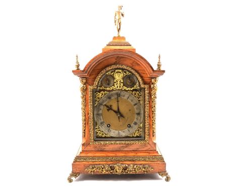 Victorian oak bracket clock, dome top with figural mount, moulded plinth and with cast gilt metal mounts, 7" arched brass dia