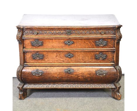 Dutch carved oak commode, late 18th Century, rectangular top with canted corners, narrow frieze drawer with guilloche and ros