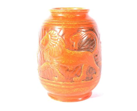 Pilkington's Royal Lancastrian, a vase with three lions, designed by William S Mycock,1930s, the tapering body in orange verm