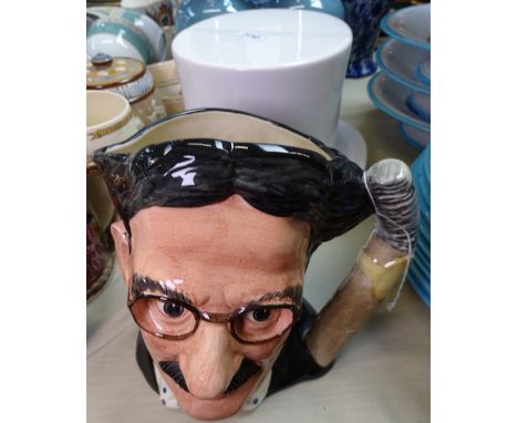 A large Doulton Groucho Marx character jug, and a ceramic top hat 